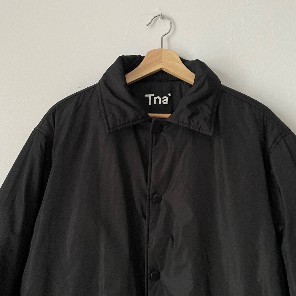 TNA Coaches black long jacket